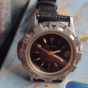 Pierre Nicol Black and Gold unisex Watch NWOT with date.Water resistant